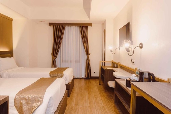 Imagen de la habitación del Hotel Fahira Bukittinggi Syariah. Foto 2