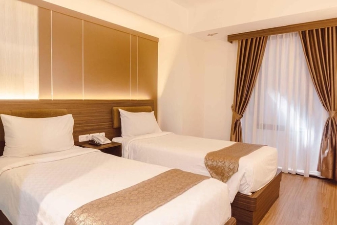 Imagen de la habitación del Hotel Fahira Bukittinggi Syariah. Foto 3