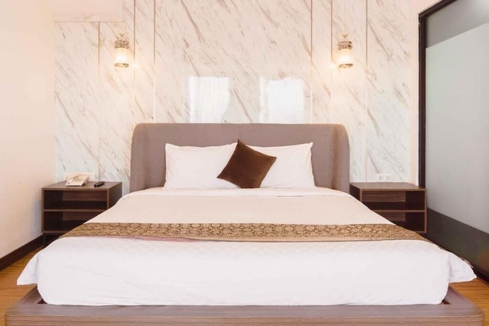 Imagen de la habitación del Hotel Fahira Bukittinggi Syariah. Foto 4