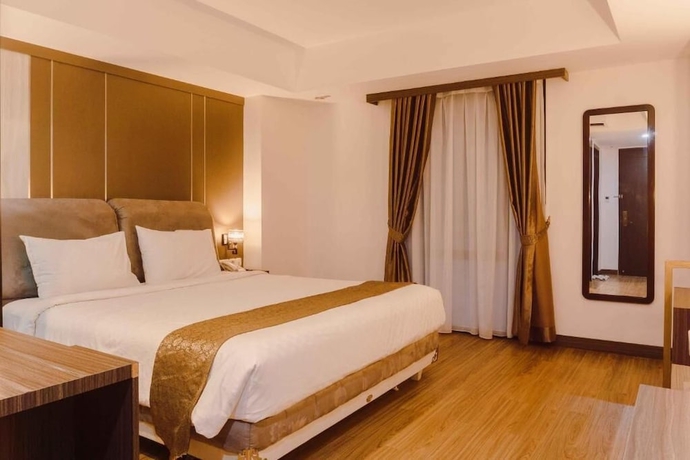 Imagen de la habitación del Hotel Fahira Bukittinggi Syariah. Foto 8
