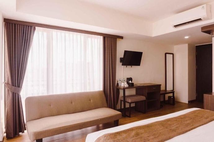 Imagen de la habitación del Hotel Fahira Bukittinggi Syariah. Foto 11