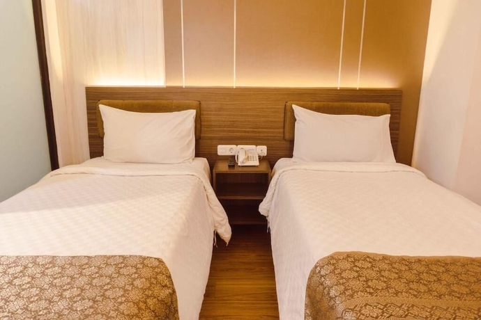 Imagen de la habitación del Hotel Fahira Bukittinggi Syariah. Foto 12