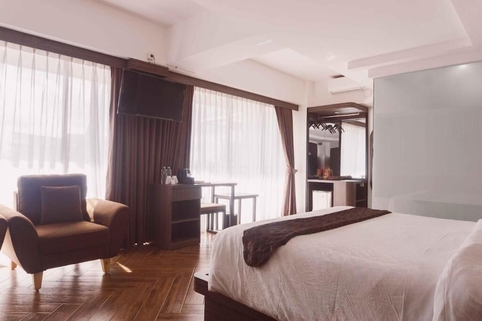 Imagen de la habitación del Hotel Fahira Bukittinggi Syariah. Foto 13