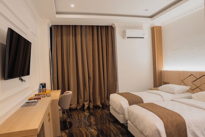 Imagen de la habitación del Hotel Fahira Syariah Padang. Foto 3