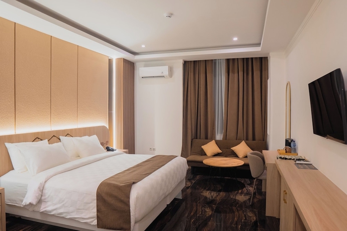 Imagen de la habitación del Hotel Fahira Syariah Padang. Foto 4