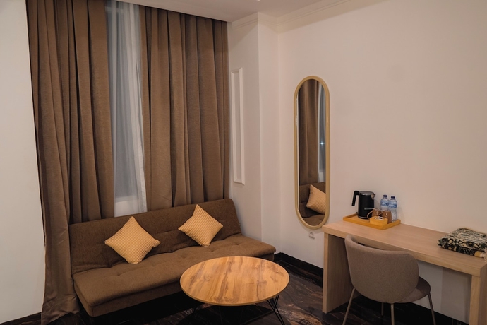 Imagen de la habitación del Hotel Fahira Syariah Padang. Foto 5