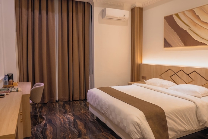 Imagen de la habitación del Hotel Fahira Syariah Padang. Foto 6