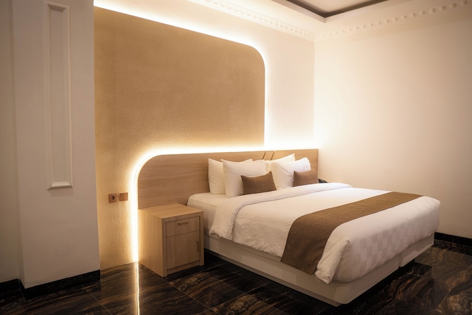 Imagen de la habitación del Hotel Fahira Syariah Padang. Foto 9