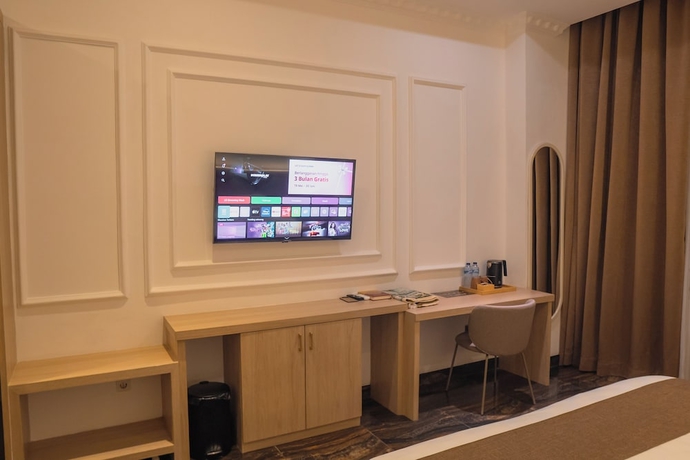 Imagen de la habitación del Hotel Fahira Syariah Padang. Foto 12