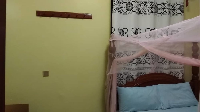 Imagen de la habitación del Hotel Faida Hill Motel. Foto 5