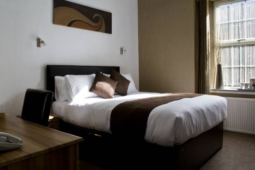 Imagen de la habitación del Hotel Fairburn. Foto 3