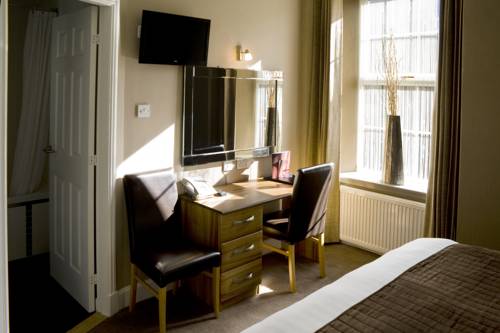 Imagen de la habitación del Hotel Fairburn. Foto 4