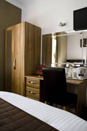 Imagen de la habitación del Hotel Fairburn. Foto 6