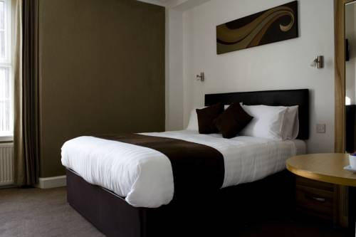 Imagen de la habitación del Hotel Fairburn. Foto 7