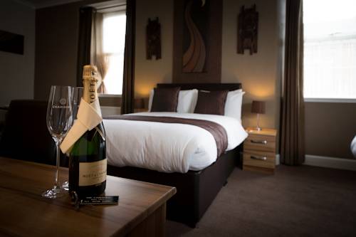 Imagen de la habitación del Hotel Fairburn. Foto 11