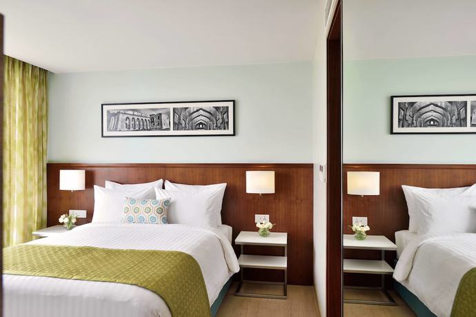 Imagen del bar/restaurante del Hotel Fairfield By Marriott Indore. Foto 7