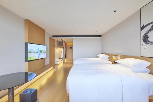 Imagen de la habitación del Hotel Fairfield by Marriott Guangzhou Konggang. Foto 14