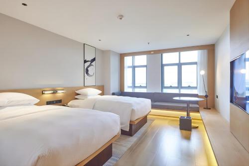 Imagen de la habitación del Hotel Fairfield by Marriott Guangzhou Konggang. Foto 15