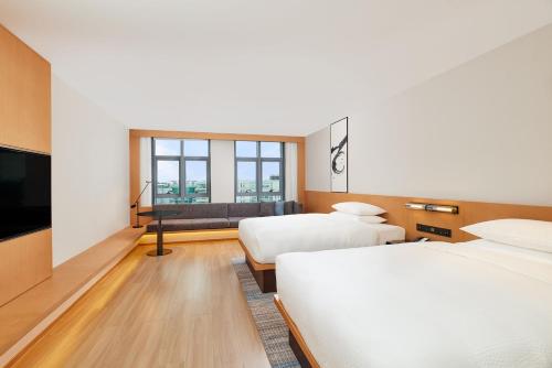Imagen de la habitación del Hotel Fairfield by Marriott Guangzhou Konggang. Foto 19