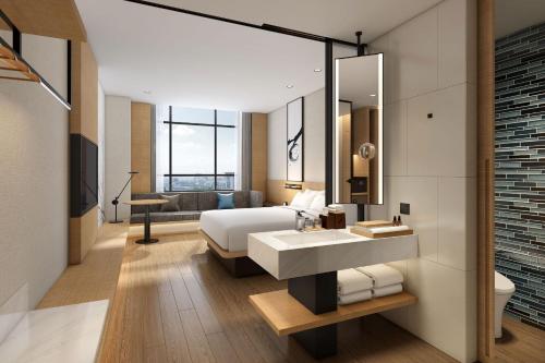 Imagen de la habitación del Hotel Fairfield by Marriott Hangzhou Gongshu. Foto 7