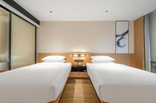 Imagen de la habitación del Hotel Fairfield by Marriott Hangzhou Wulin Square, China. Foto 19