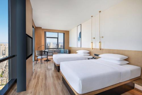 Imagen de la habitación del Hotel Fairfield by Marriott Kunming Xinying. Foto 15