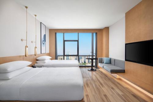 Imagen de la habitación del Hotel Fairfield by Marriott Kunming Xinying. Foto 16