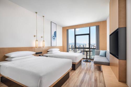 Imagen de la habitación del Hotel Fairfield by Marriott Kunming Xinying. Foto 17