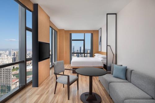 Imagen de la habitación del Hotel Fairfield by Marriott Kunming Xinying. Foto 18