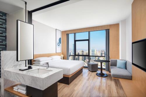 Imagen de la habitación del Hotel Fairfield by Marriott Kunming Xinying. Foto 20