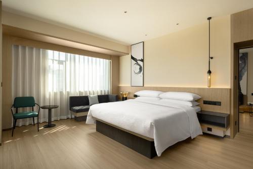 Imagen de la habitación del Hotel Fairfield by Marriott Lijiang Ancient Town. Foto 11