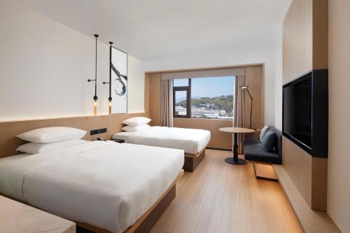 Imagen de la habitación del Hotel Fairfield by Marriott Lijiang Ancient Town. Foto 12