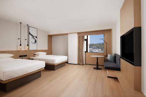 Imagen de la habitación del Hotel Fairfield by Marriott Lijiang Ancient Town. Foto 14