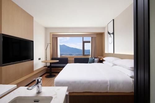Imagen de la habitación del Hotel Fairfield by Marriott Lijiang Ancient Town. Foto 15