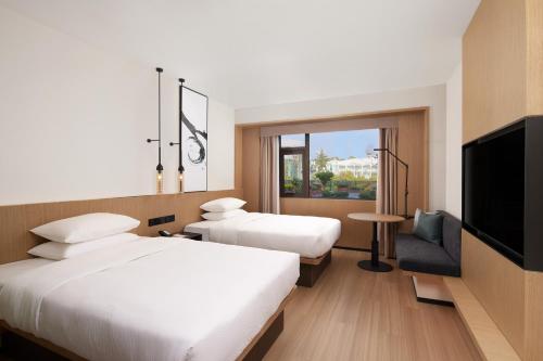 Imagen de la habitación del Hotel Fairfield by Marriott Lijiang Ancient Town. Foto 16