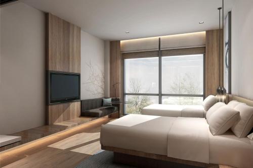 Imagen de la habitación del Hotel Fairfield by Marriott Yangzhou Slender West Lake. Foto 16