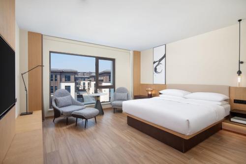 Imagen de la habitación del Hotel Fairfield by Marriott Yangzhou Slender West Lake. Foto 20