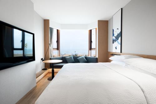 Imagen de la habitación del Hotel Fairfield by Marriott Yantai, Huang-Bohai New Area. Foto 17