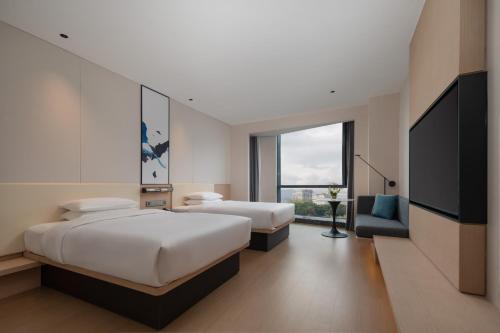 Imagen de la habitación del Hotel Fairfield by Marriott Yiwu. Foto 16
