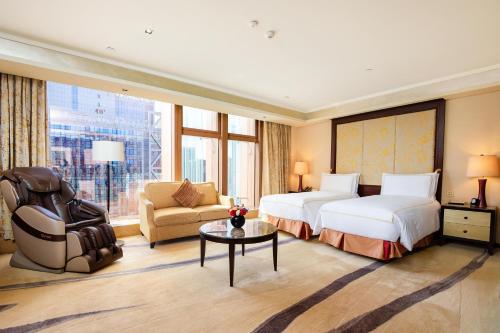 Imagen de la habitación del Hotel Fairmont Beijing. Foto 17