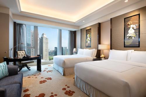 Imagen de la habitación del Hotel Fairmont Chengdu. Foto 11