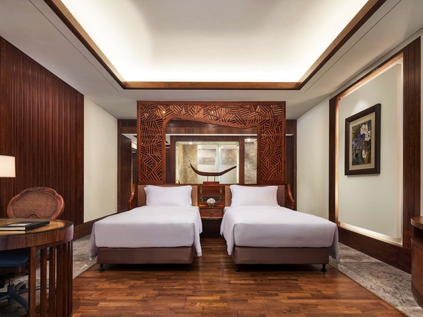 Imagen de la habitación del Hotel Fairmont Sanya Haitang Bay. Foto 18