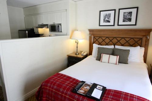 Imagen de la habitación del Hotel Fairmont Tremblant. Foto 17