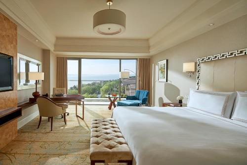 Imagen de la habitación del Hotel Fairmont Yangcheng Lake. Foto 18
