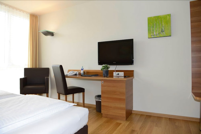 Imagen de la habitación del Hotel Fairmotel Dornbirn. Foto 11