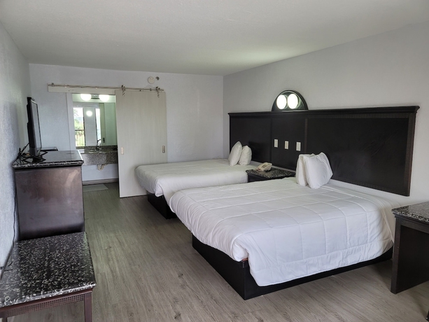 Imagen de la habitación del Hotel Fairway Inn. Foto 5