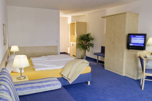Imagen de la habitación del Hotel Fairway, Walldorf. Foto 3