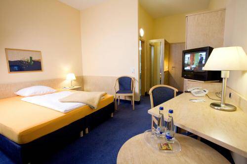 Imagen de la habitación del Hotel Fairway, Walldorf. Foto 4