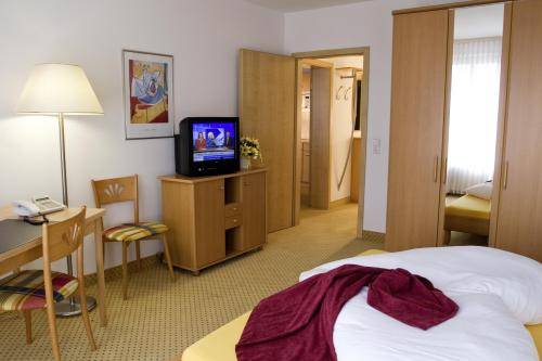 Imagen de la habitación del Hotel Fairway, Walldorf. Foto 5