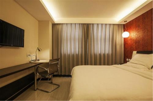 Imagen de la habitación del Hotel Fairyland Shanghai New International Exihibi. Foto 5